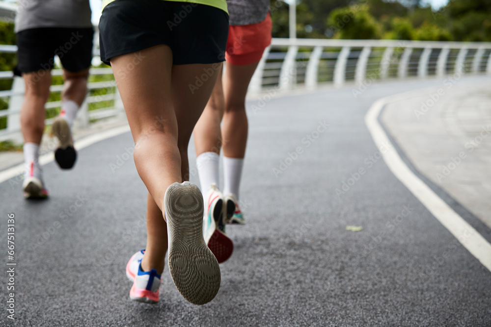 close-up of legs and feet of young asian people running jogging outdoors close-up of legs and feet of young asian people running jogging outdoors