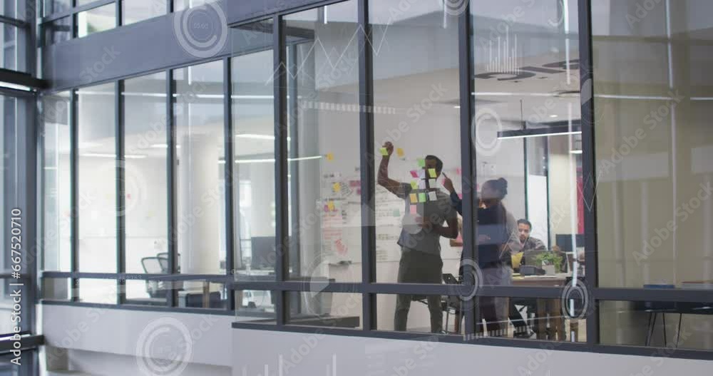 Animation of loading bars and circles over diverse coworkers discussing strategy on sticky notes Animation of loading bars and circles over diverse coworkers discussing strategy on sticky notes