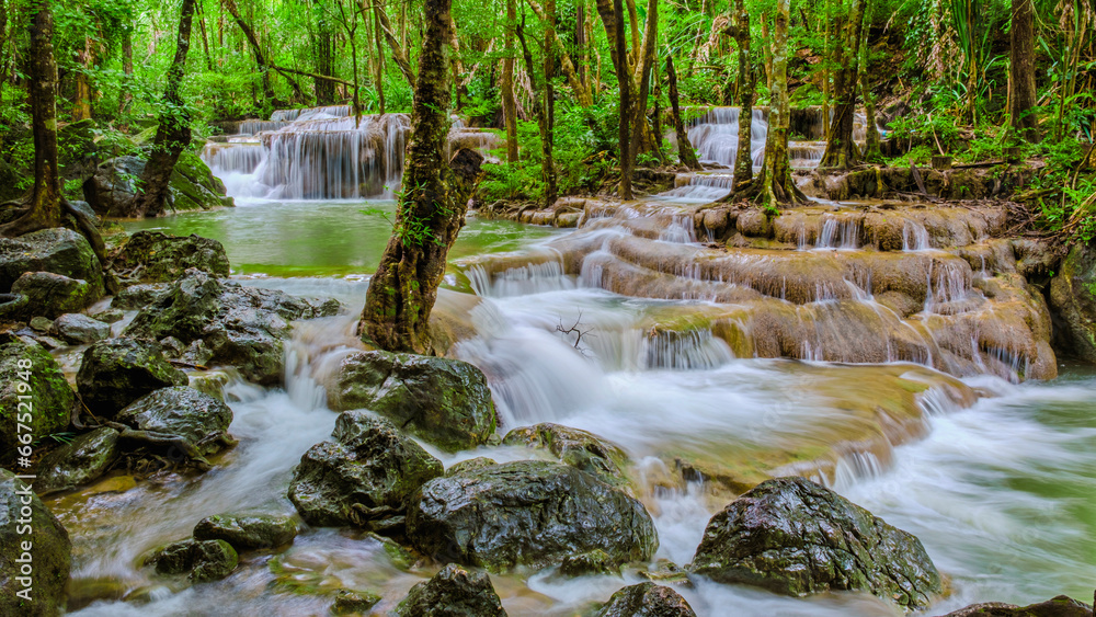 Erawan Waterfall Thailand, a beautiful deep forest waterfall in Thailand. Erawan Waterfall in National Park Erawan Waterfall Thailand, a beautiful deep forest waterfall in Thailand. Erawan Waterfall in National Park