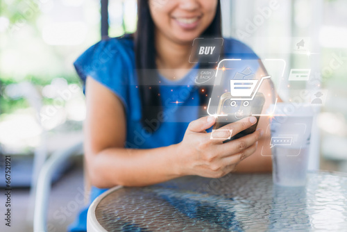 Woman using smart phone shopping online with interface virtual graphic icons at the cafe. Online shopping, Mobile payment with wallet app technology. Digital banking and financial technology concept. photo