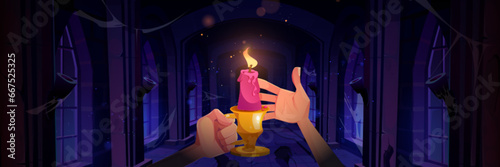 Hand holding candle in medieval castle corridor. Dark fantasy palace interior with light from burning flame cartoon halloween background. Scary and mysterious fairytale illustration with sparkle