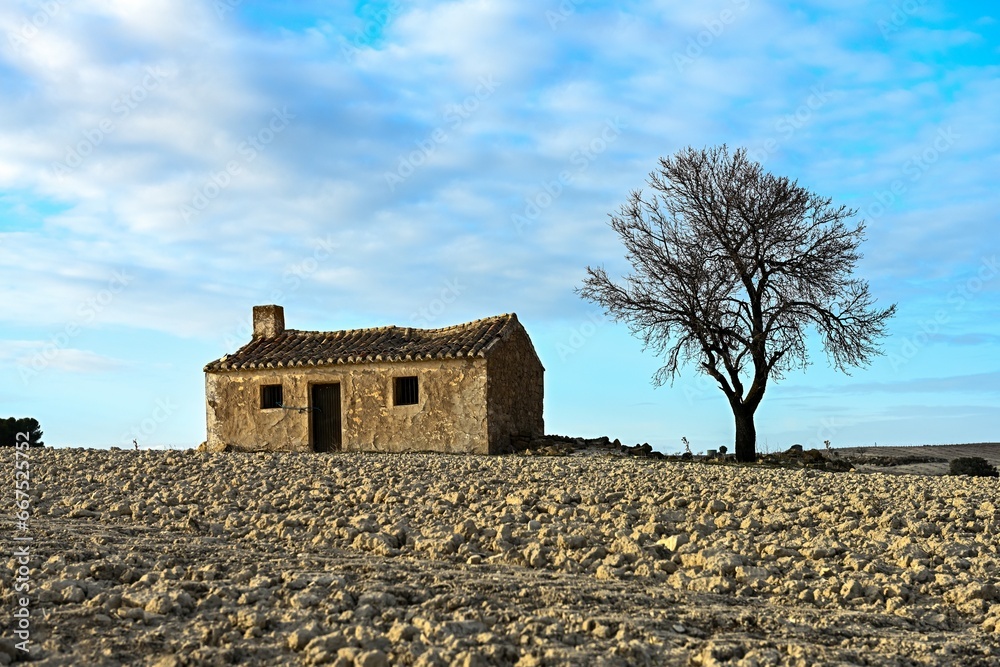 Small rural house in the cereal fields of the Geopark of Granada. Small rural house in the cereal fields of the Geopark of Granada.