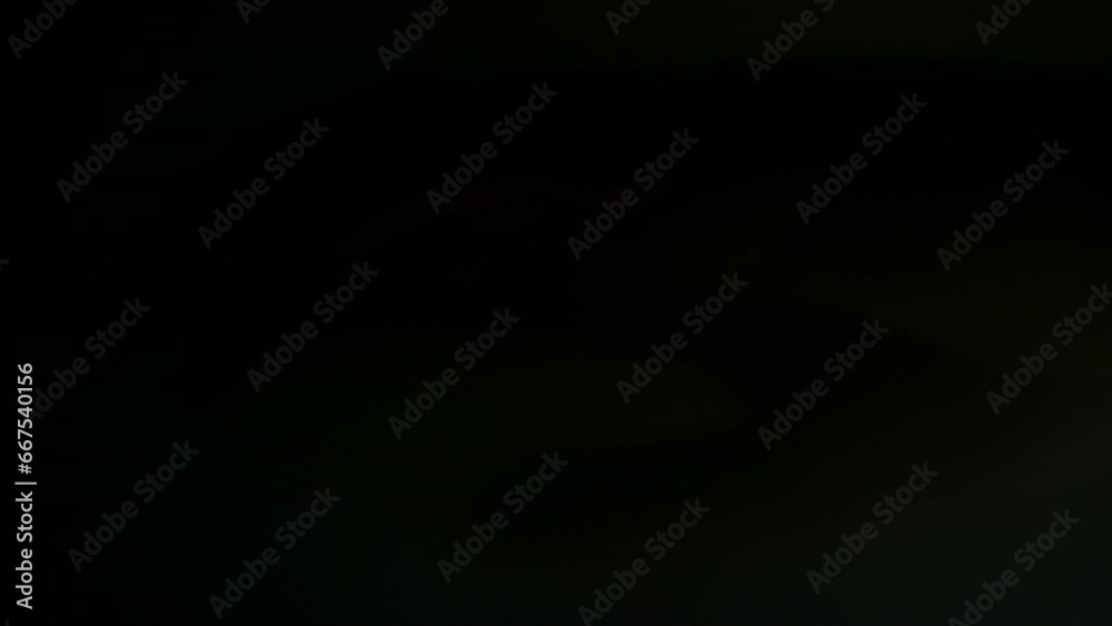 Macro closeup of hand of unrecognizable lab growing baby floating in