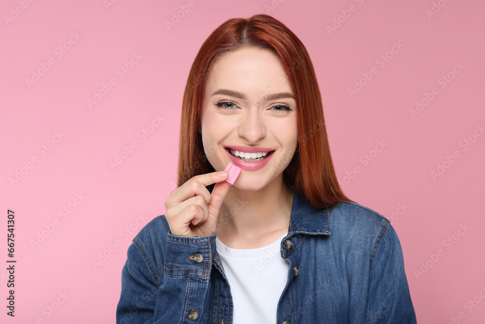 Beautiful woman with bubble gum on pink background Beautiful woman with bubble gum on pink background