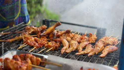 Wallpaper Mural Thai Street food grilled chickens sold on the cart. Cheap delicious and popular for locals lifestyle. Torontodigital.ca