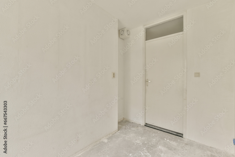 an empty room with white walls and no one person in the room, or someone standing on the other wall an empty room with white walls and no one person in the room, or someone standing on the other wall