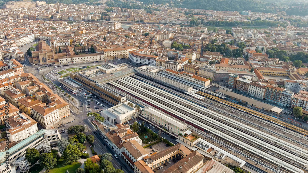 Florence, Italy. Central railway station (Stazione Ferroviaria Firenze Santa Maria Novella) Panoramic view of the city. Summer. Evening, Aerial View