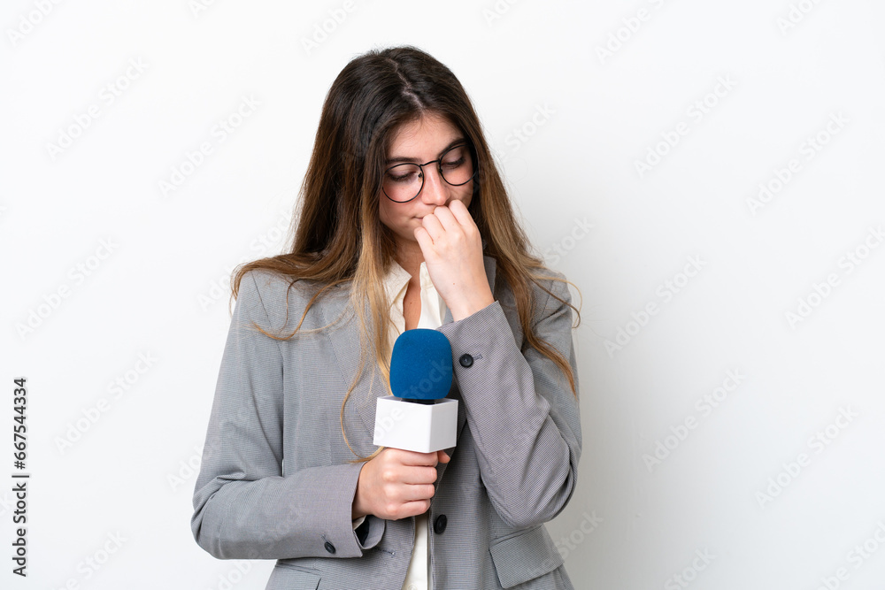 Young caucasian TV presenter woman isolated on white background having doubts Young caucasian TV presenter woman isolated on white background having doubts