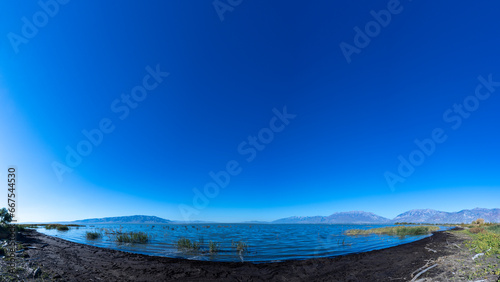 travel usa and north america, Utah lake close to Salt Lake City, panoramic view over the lake on a cloudless day bright sunny day