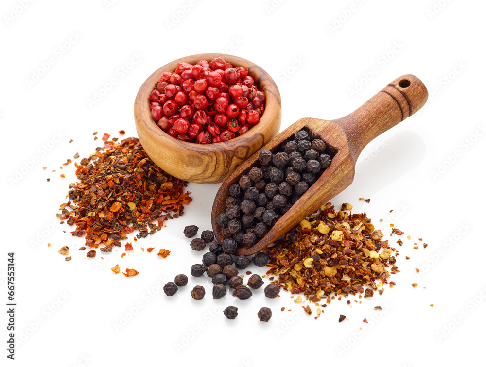Black pepper in wooden spoon, peppercorn in wooden bowl and crushed pepper isolated on white background Black pepper in wooden spoon, peppercorn in wooden bowl and crushed pepper isolated on white background