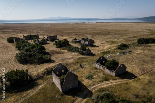 Aerial view of Ruins next to Busko Jezero lake in Bosnia and Herzegovina. photo