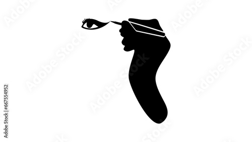 Visagiste, Makeup artist's hand paints eyes with mascara