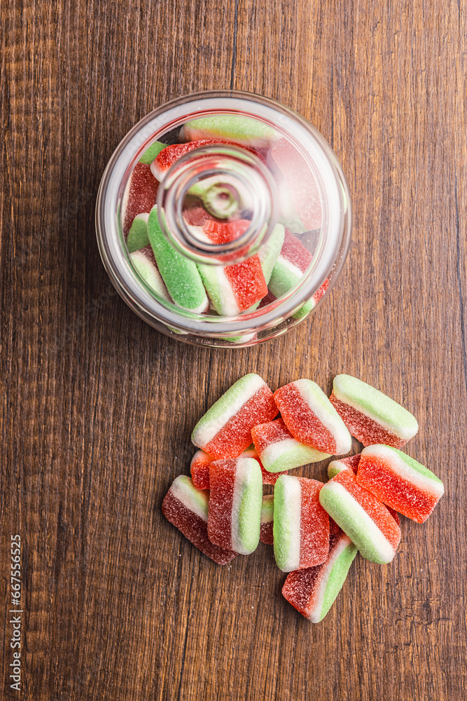 Watermelon jelly candies on wooden table. Top view. Watermelon jelly candies on wooden table. Top view.