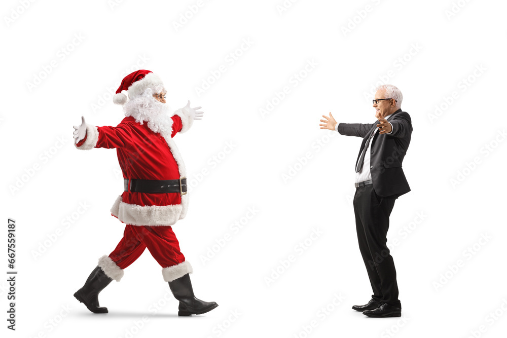 Full length profile shot of santa claus meeting with a mature businessman Full length profile shot of santa claus meeting with a mature businessman