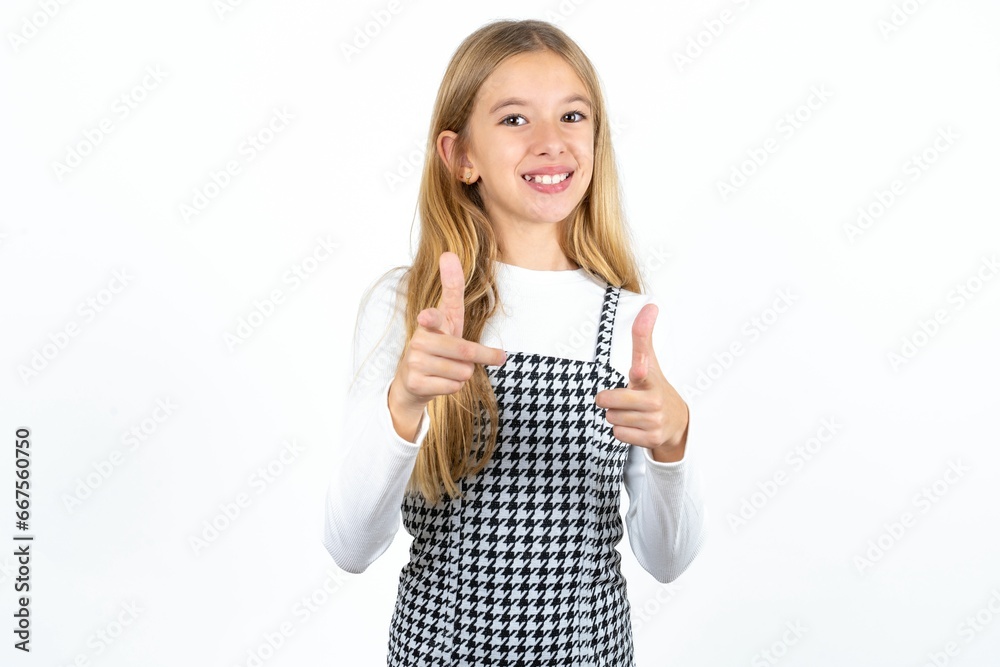 Beautiful caucasian teen girl directs fingers at camera selects someone. I recommend you. Best choice Beautiful caucasian teen girl directs fingers at camera selects someone. I recommend you. Best choice