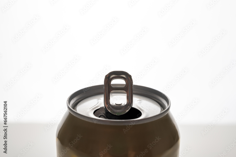 Open beverage can, used, shot against the light, with raised opening lip. Recycling of waste and aluminum. Recyclable material.
Open beverage can, used, shot against the light, with raised opening lip. Recycling of waste and aluminum. Recyclable material.