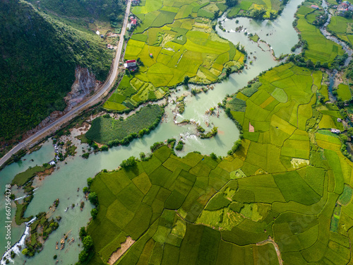 Aerial view of dawn on mountain at Ngoc Con ward  Trung Khanh town  Cao Bang province  Vietnam with river  nature  green rice fields. Near Ban Gioc waterfall.