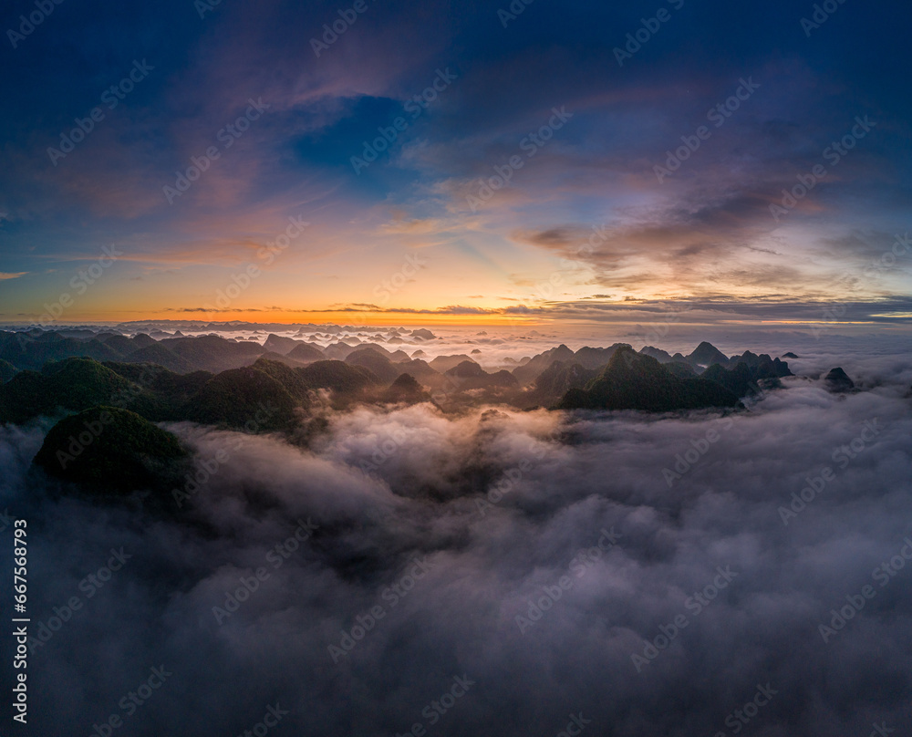 Fototapeta premium Aerial landscape in Phong Nam valley, an extreme scenery landscape at Cao bang province, Vietnam with river, nature, green rice fields