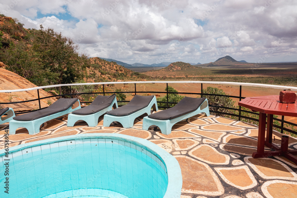 View of a swimming pool against a scenic view point at Tsavo East National Park, Kenya