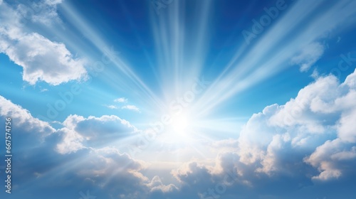 sun rays piercing through the clouds in a serene blue sky  portraying the beauty of atmospheric phenomena.