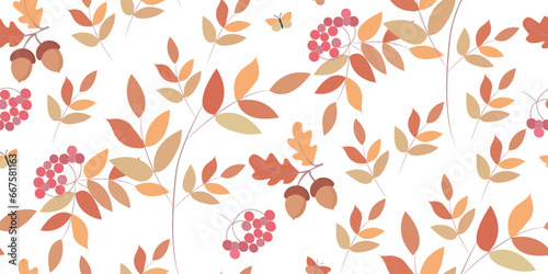 Seamless botanical background with autumn leaves and rowan branches. Great for printing on fabric and paper. A bright autumn print.