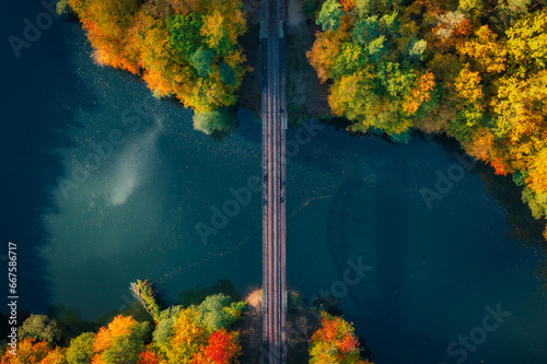 Autumnal scenery and the railway bridge in Rutki, Kashubia. Poland