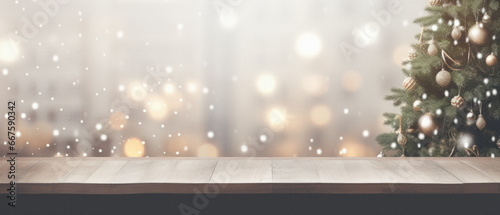 Empty wooden table with christmas tree bokeh background. photo
