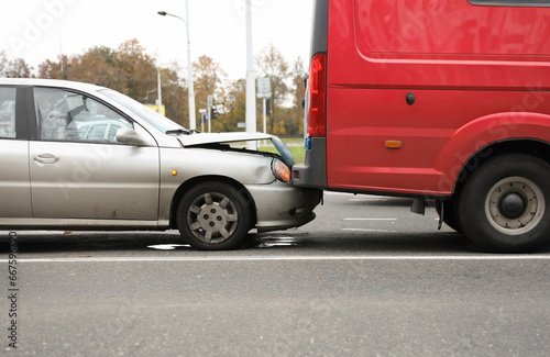On road car crashed into trunk truck an accident. City street, Warning triangle. Assess situation and degree complexity accident. Deprivation or fine. Compliance with traffic regulations