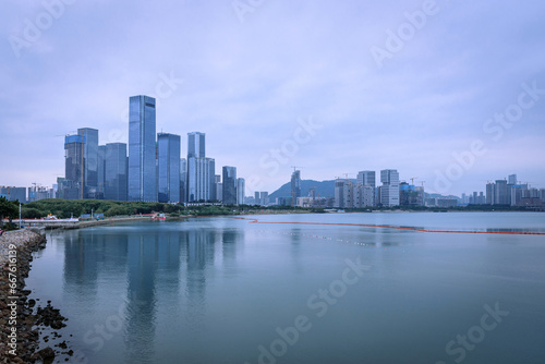 The harbor scenery of Baoan District, Shenzhen, china. City skyline at dusk. Modern business office building. 