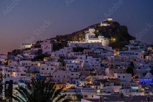 Panoramic view of the picturesque illuminated island of Ios in Greece at sunset © DIMITRIOS