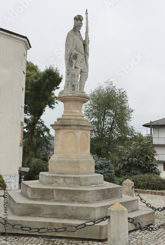 statue of person saint Florian against fire in Frysztak town