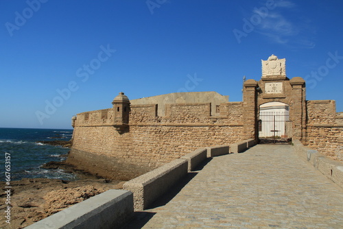 Fototapeta Castle of San Sebastian, a fortified enclosure  in Cadiz, Spain.