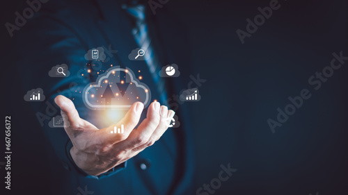 Business hand using smartphone with virtual popup icon of cloud computer Storage and data transfer Cloud network , Cloud technology. Networking and internet service concept.