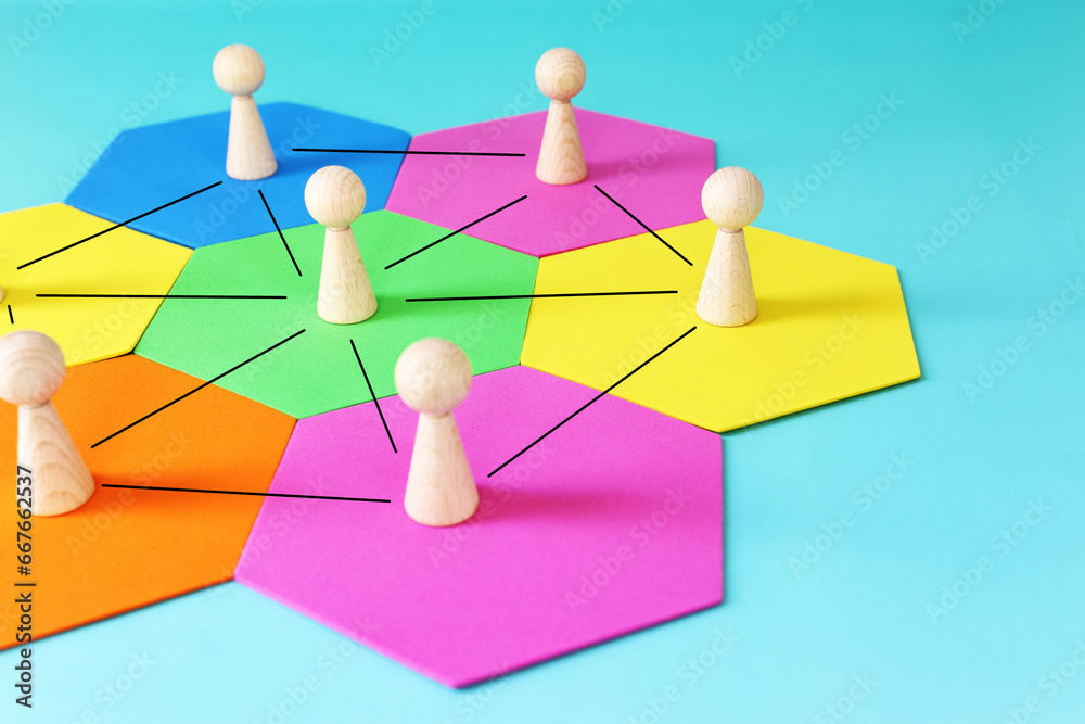 image of wooden figures. Concept of human resources, leadership and management image of wooden figures. Concept of human resources, leadership and management
