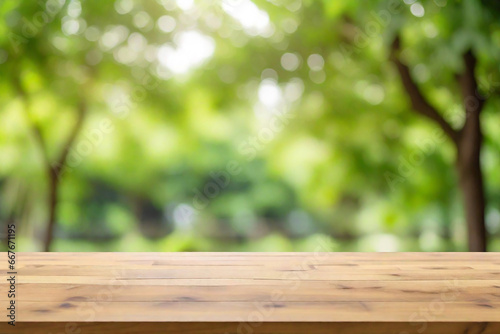 Empty wood table top and blurred view from green tree garden bokeh background. Product and food display
