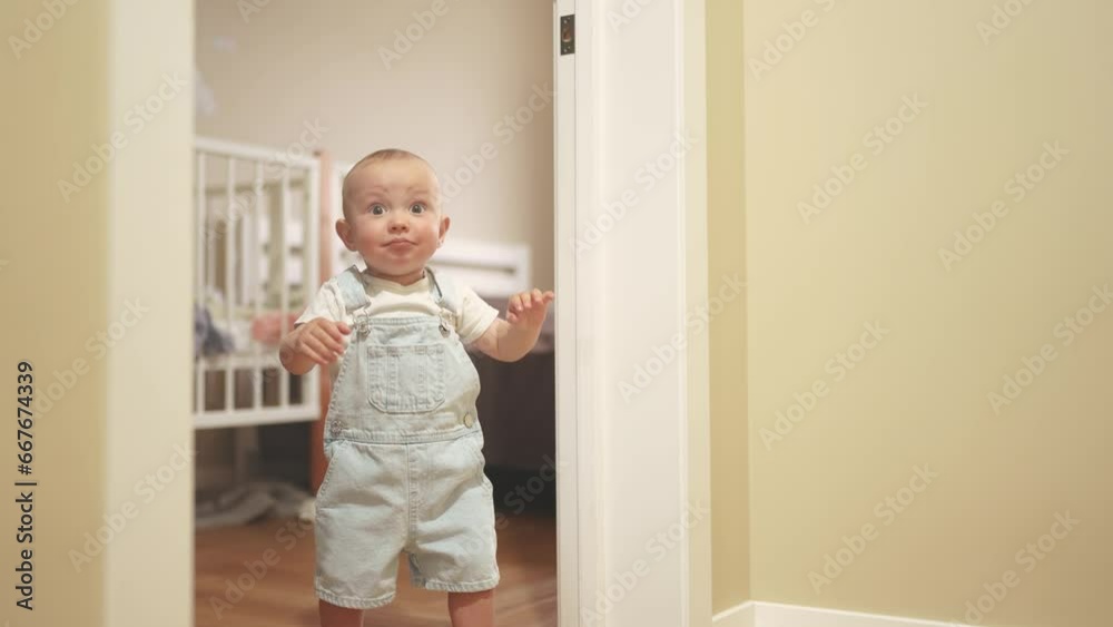baby first steps. son a baby toddler learning to walk take first steps. happy family kid dream concept. baby indoors learning to walk indoors. baby son lifestyle training concept baby first steps. son a baby toddler learning to walk take first steps. happy family kid dream concept. baby indoors learning to walk indoors. baby son lifestyle training concept