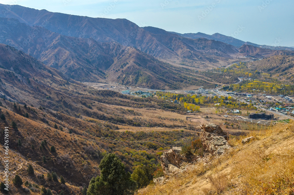 Chimgan village scenic view from Sandy Pass trail in Chatkal mountains (Bostanliq district, Tashkent region, Uzbekistan) Chimgan village scenic view from Sandy Pass trail in Chatkal mountains (Bostanliq district, Tashkent region, Uzbekistan)