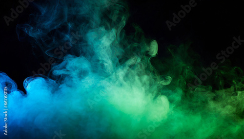 abstract backdrop cloud of green and blue smoke on a black isolated background soft mystery horror design spooky background texture concept