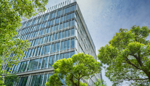 modern office building with green trees