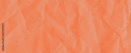 Recycled crumpled orange paper texture background. Royalty high-quality free stock photo image of Wrinkled and creased abstract backdrop, wallpaper with copy space, top view