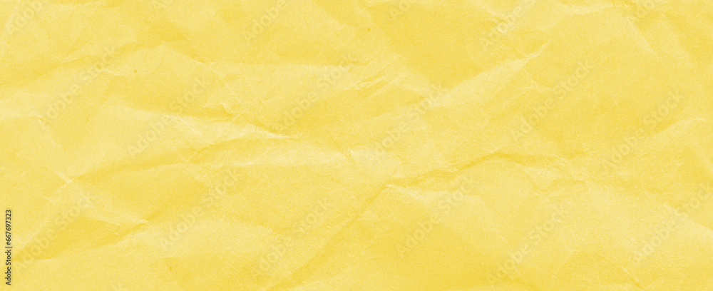 Recycled crumpled yellow paper texture background. Royalty high-quality free stock photo image of Wrinkled and creased abstract backdrop, wallpaper with copy space, top view Recycled crumpled yellow paper texture background. Royalty high-quality free stock photo image of Wrinkled and creased abstract backdrop, wallpaper with copy space, top view