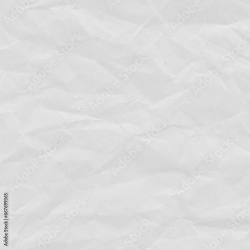 Recycled crumpled white paper texture background. Royalty high-quality free stock photo image of Wrinkled and creased abstract backdrop, wallpaper with copy space, top view