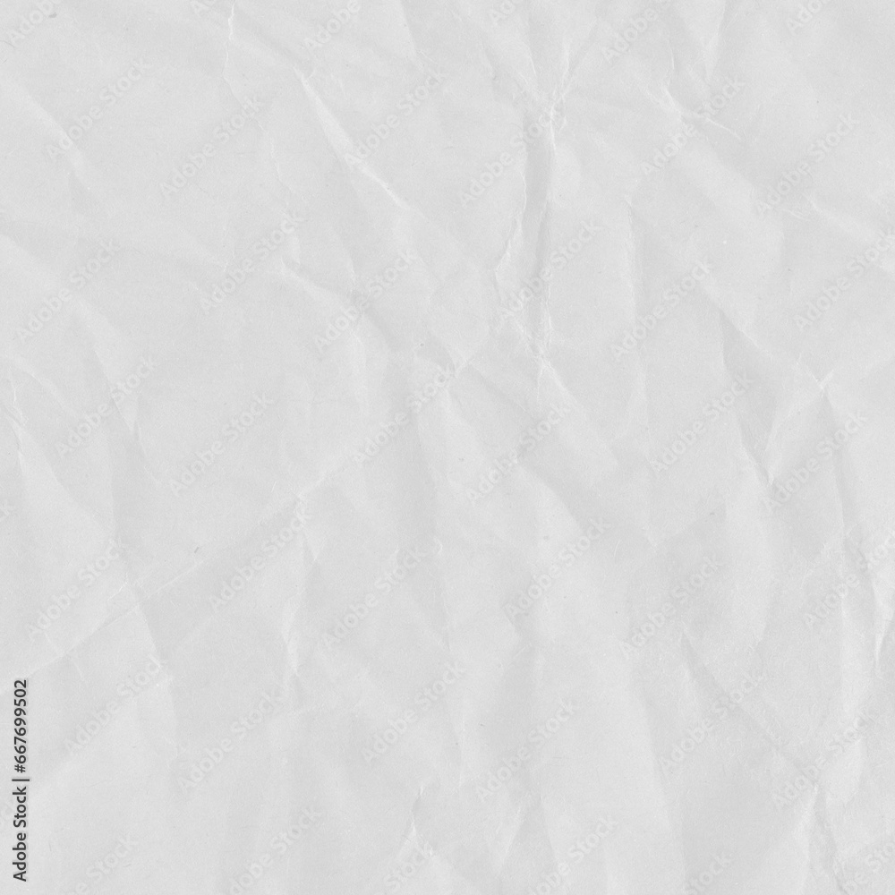 Recycled crumpled white paper texture background. Royalty high-quality free stock photo image of Wrinkled and creased abstract backdrop, wallpaper with copy space, top view