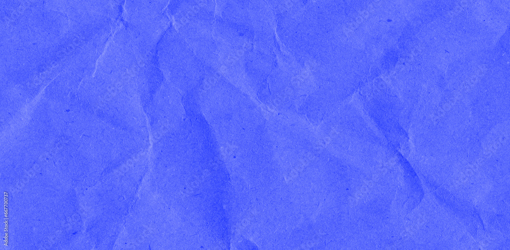 Recycled crumpled blue paper texture background. Royalty high-quality free stock photo image of Wrinkled and creased abstract backdrop, wallpaper with copy space, top view