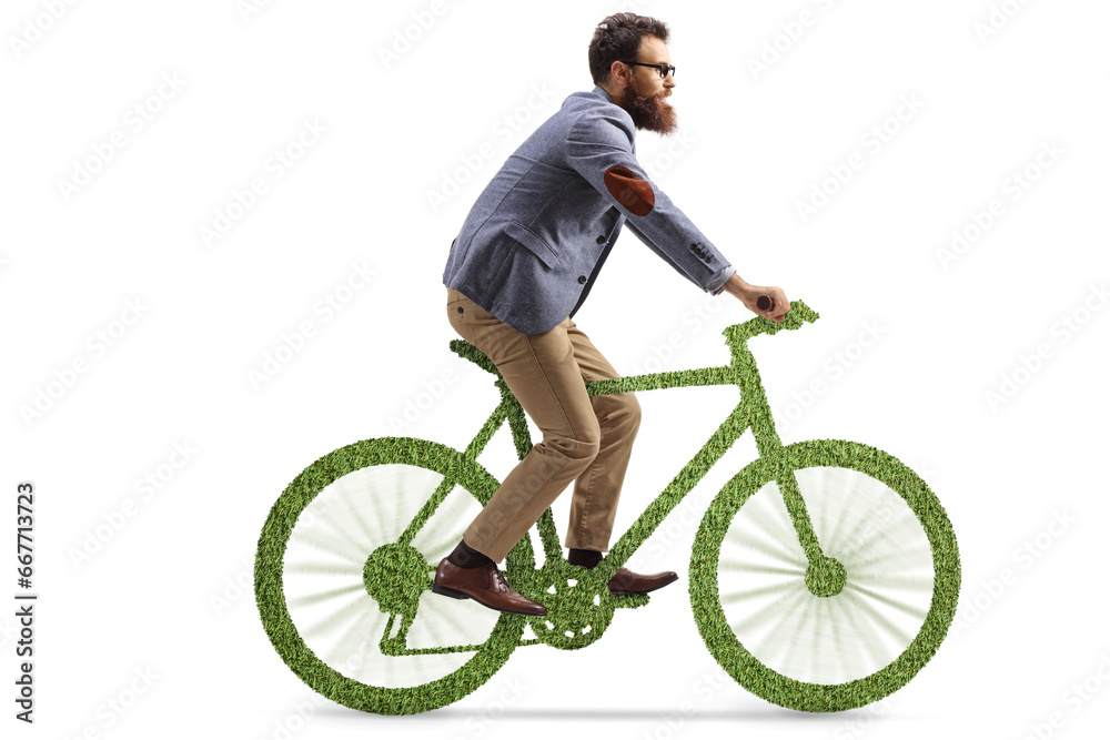 Naklejka premium Bearded man riding a bicycle made of grass