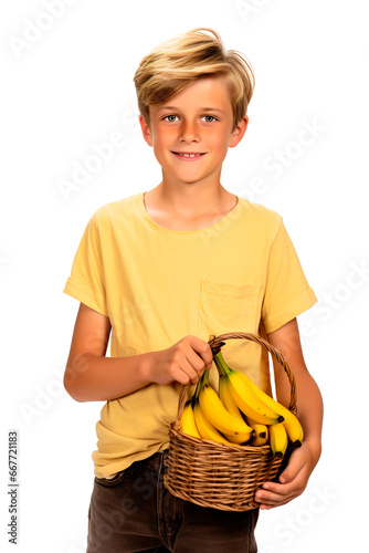 Caucasian boy holding basket with bananas posing over white transparent background