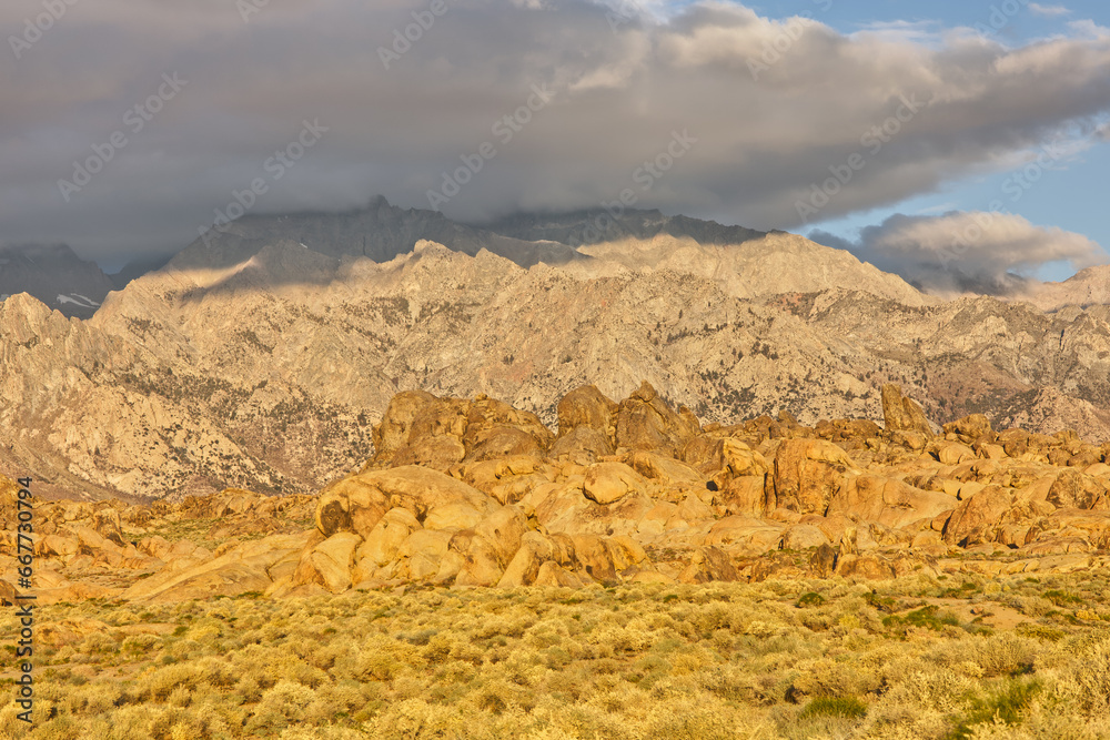 Alabama Hills Landscape with Eastern Sierra Nevada Mountains in the Background During Morning Golden Hour