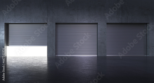 Tela garages with metal shutters and concrete wall, light inside.