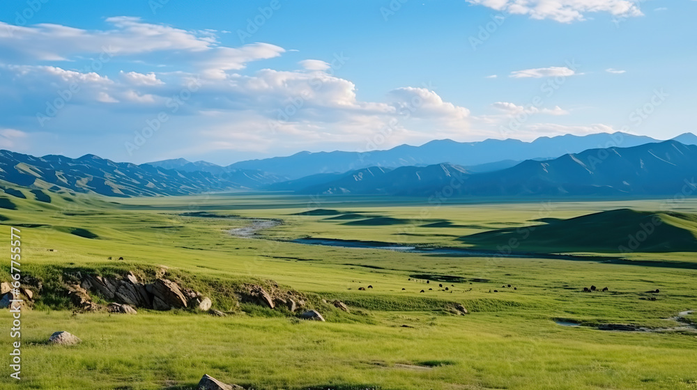 Sweeping vista landscape of the Assy Plateau, a large mountain steppe valley and summer pasture 100km from Almaty, Kazakhstan.