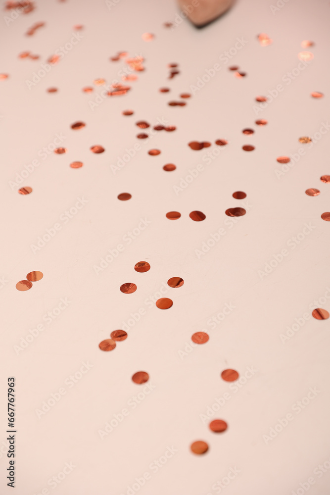 pink round confetti on a white background pink round confetti on a white background
